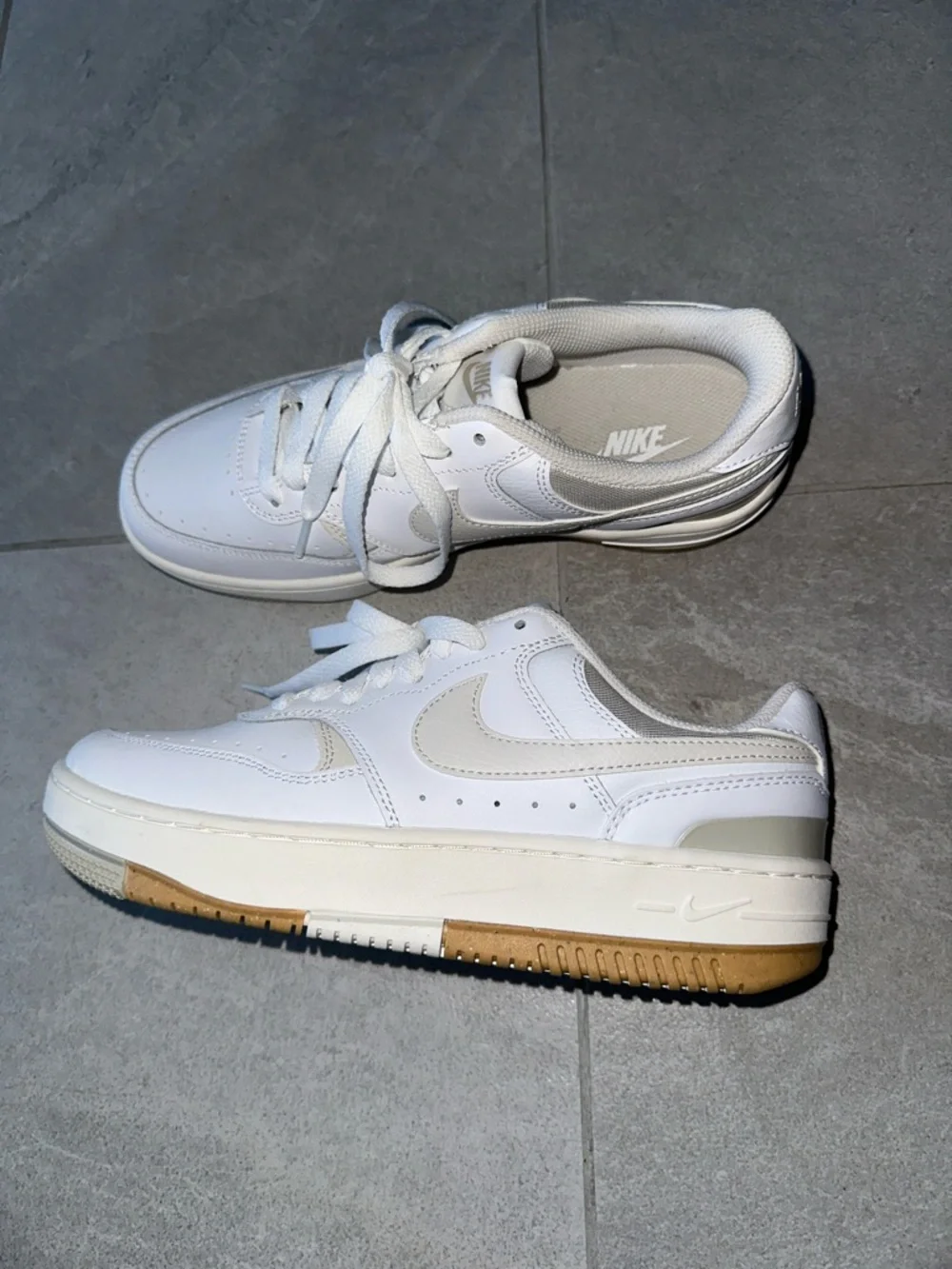 Nike White Sneakers with Cream Swoosh and Gum Outsole